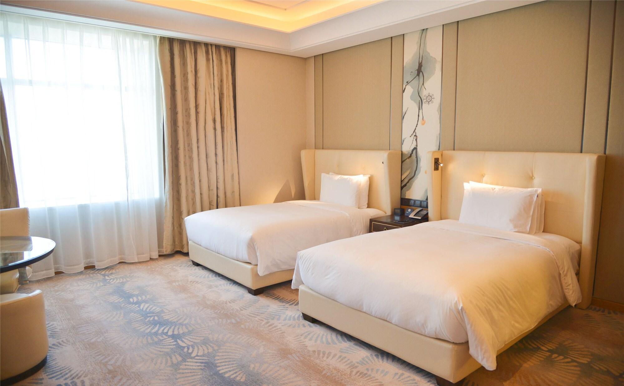 Hilton Urumqi Esterno foto